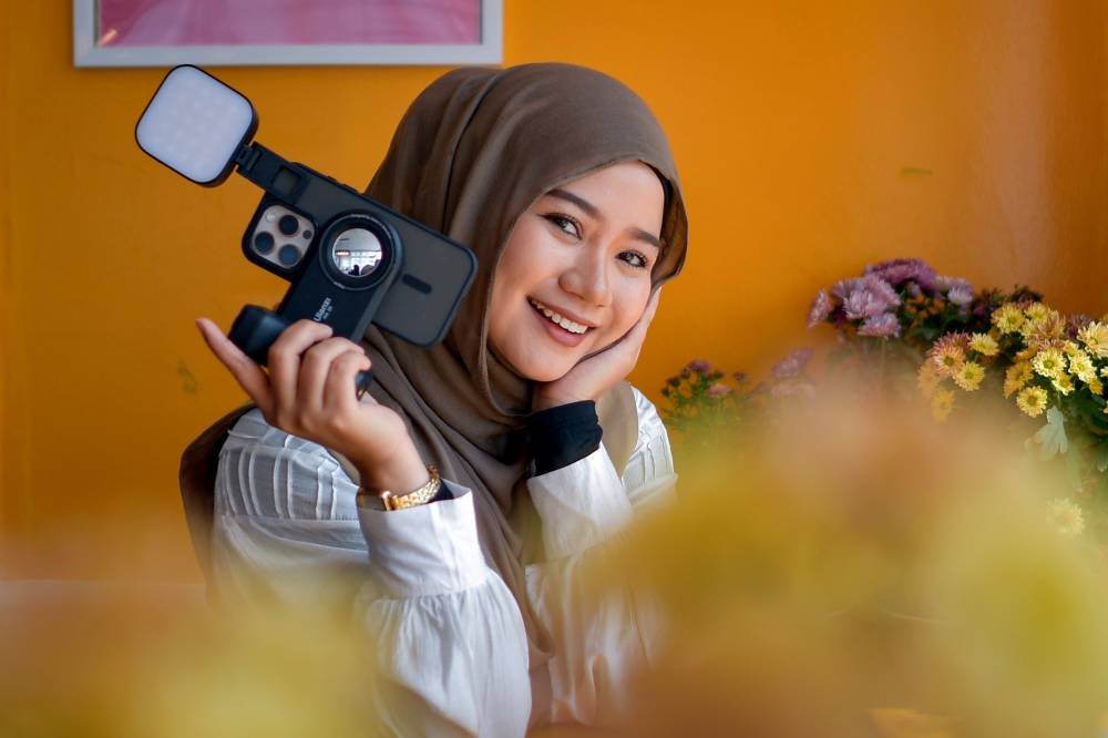 Wedding Content Creator, Farah Dafri, 34, during an interview with Bernama about her new career at Koffie Lane, recently. Photo by Bernama