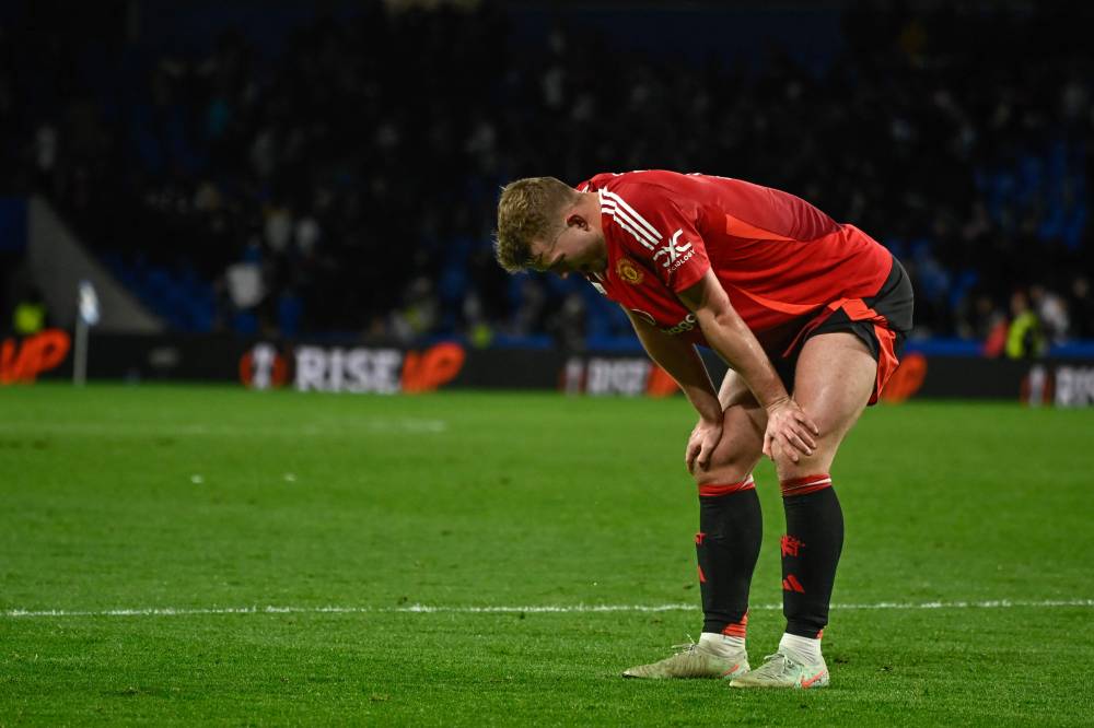 Manchester United's Dutch defender #04 Matthijs de Ligt reacts at the end of the UEFA Europa League Round of 16 first let football match between Real Sociedad and Manchester United at Anoeta Stadium in San Sebastian on March 6, 2025. (Photo by ANDER GILLENEA / AFP)