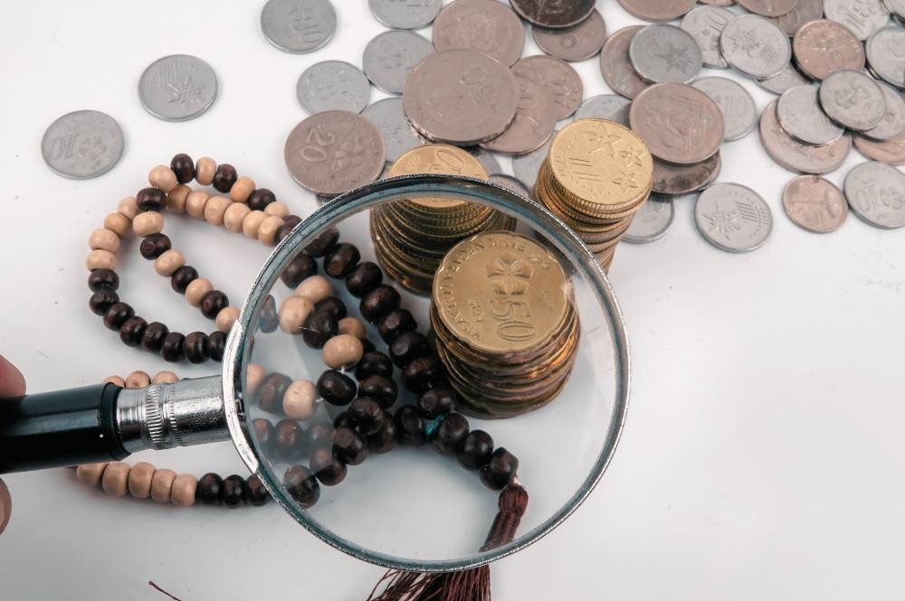 Wealth in Islam is not seen as mere ownership but as a trust from Allah SWT. Photo: Illustrated by Sinar Daily