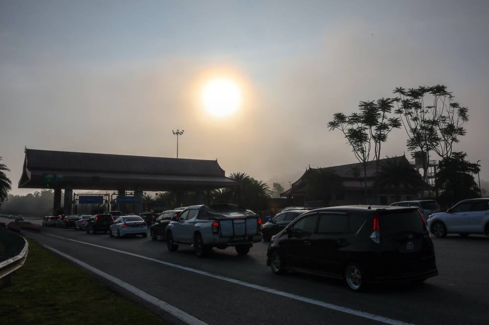 Each vehicle contains similar stories: students eager to see their parents, parents preparing favourite dishes, grandparents waiting. - Bernama photo