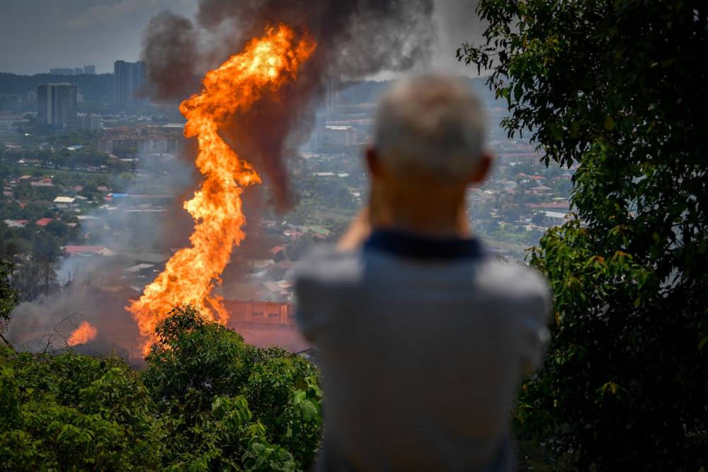 The explosion has also reignited debate over the placement of housing developments near underground gas pipelines. - Bernama photo