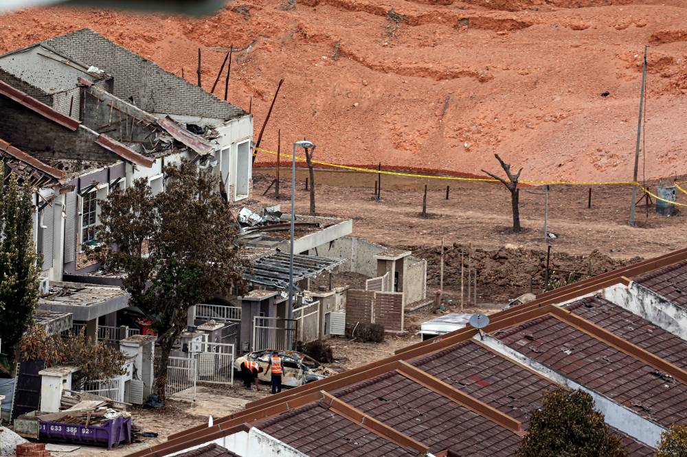 Several vehicles parked in the residential area were completely burnt following a fire involving a gas pipeline at Jalan Putra Harmoni, Putra Heights, during an inspection on April 3, 2025. - Photo by Bernama