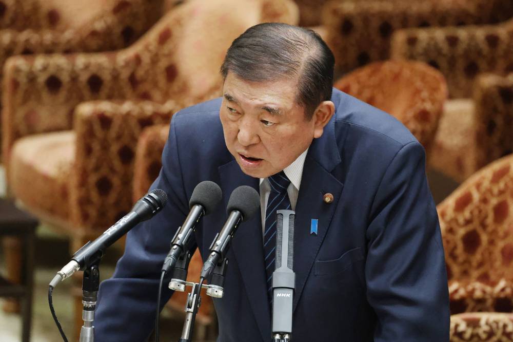 Japan's Prime Minister Shigeru Ishiba responds to questions at the House of Representatives cabinet committee at the parliament in Tokyo on April 4, 2025.
US President Donald Trump's tariffs on Japanese goods are a "national crisis", Ishiba said on April 4 ahead of cross-party talks on mitigating the impact.
Photo by AFP