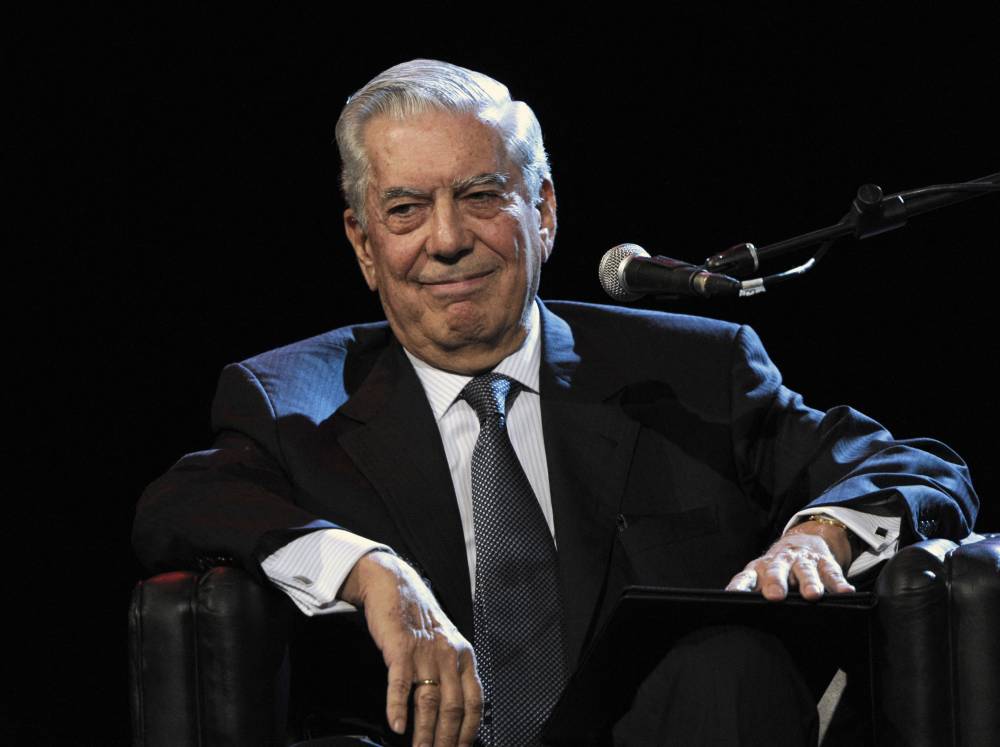 Peruvian writer and Nobel Prize for Literature Mario Vargas Llosa smiles during a public interview at Buenos Aires' International Book Fair on April 21, 2011. - (Photo by Juan MABROMATA / AFP)