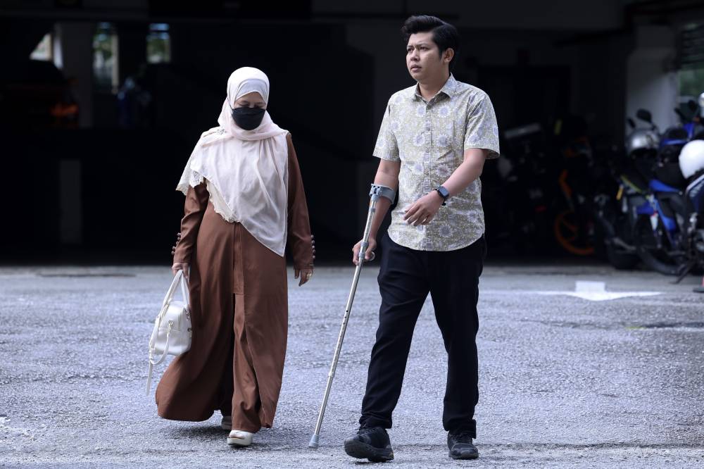 Father of Zayn Rayyan Abdul Matin, Zaim Ikhwan Zahari at the Petaling Jaya Sessions Court today to continue proceedings over the charge of neglecting the autistic child. Photo by Bernama