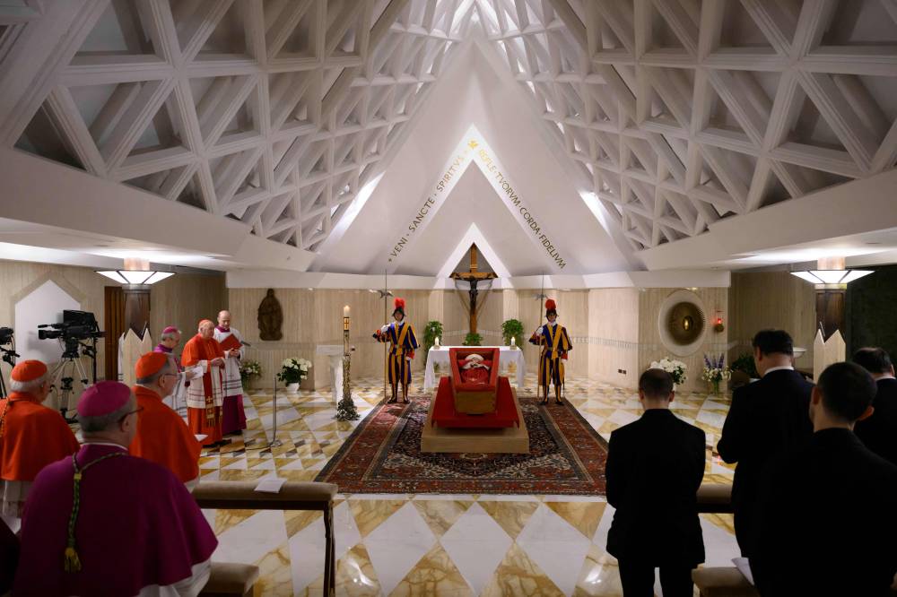 Pope Francis in his open coffin during the rite of the Confirmation of the Death of the Pontiff at the Chapel of Santa Marta in The Vatican. Photo by Handout/VATICAN MEDIA/AFP