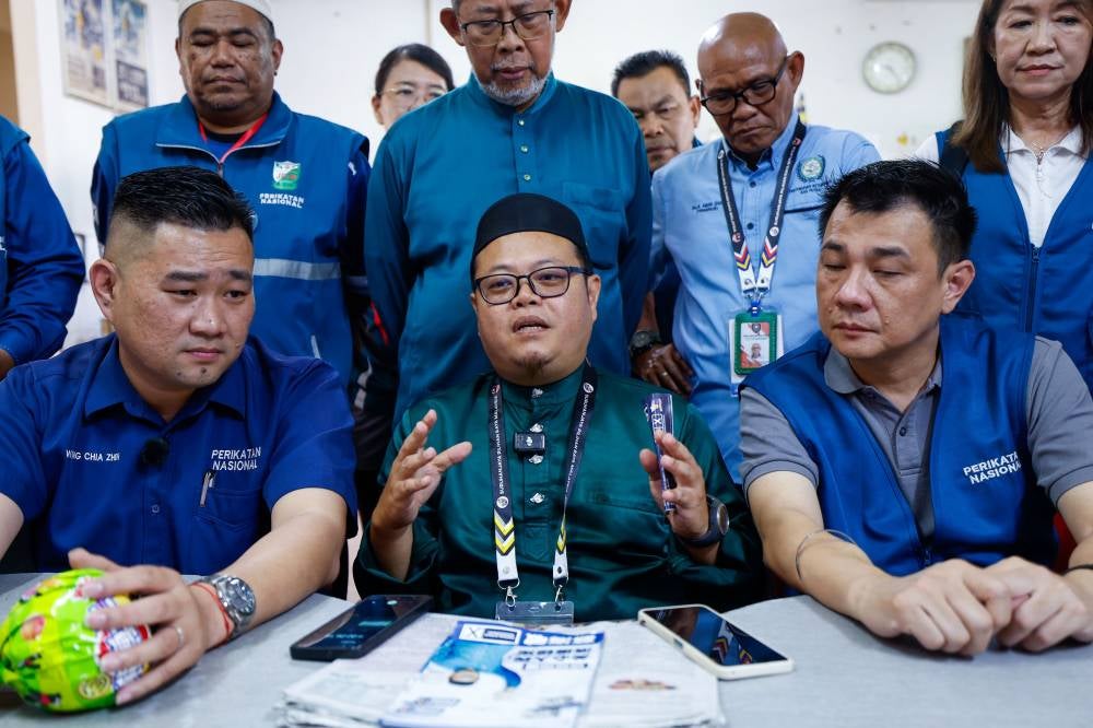 Perikatan Nasional candidate Abd Muhaimin Malek (centre). Bernama FILE PIX