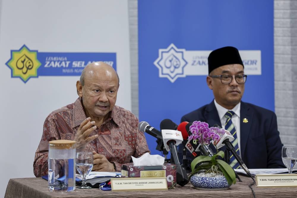 LZS Chairman Tan Sri Syed Anwar Jamalullail (left) speaking at a press conference on Selangor's Zakat Distribution and Collection Performance in 2024 at Menara Zakat Sultan Idris Shah, Section 14 today. Photo by Bernama