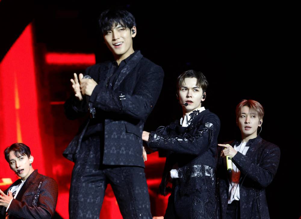 (L-R) DK, Mingyu, Vernon and Wonwoo of Seventeen perform onstage at BMO Stadium on Nov 9, 2024 in Los Angeles, California. - (Photo by Frazer Harrison / AFP)