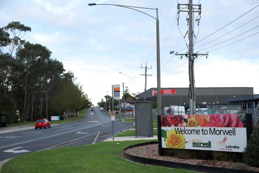 Welcome signage to Morwell, south of Melbourne, is seen on the town's outskirts on April 30, 2025. - (Photo by MARTIN KEEP / AFP)