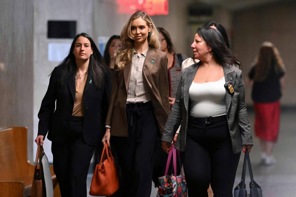 Alleged victim of Harvey Weinstein, Kaja Sokola (C) arrives at Manhattan Criminal Court during his rape and sexual assault re-trial in New York on May 8, 2025. - (Photo by ANGELA WEISS / AFP)