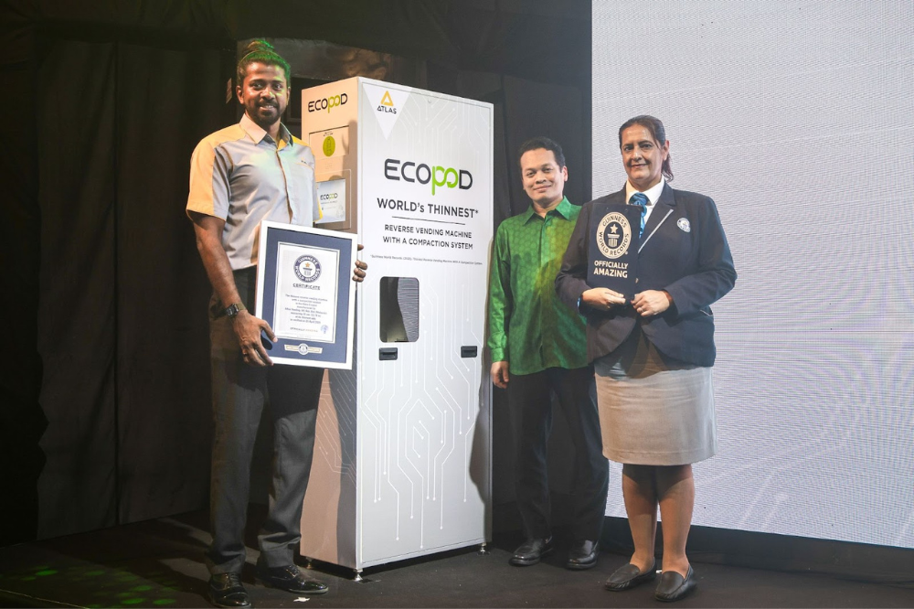 (from left) Etika Group of Companies chief executive officer Santharuban Thurai Sundaram Natural, Resources and Environmental Sustainability Minister Nik Nazmi Nik Ahmad and Sonia Ushirogochi from Guinness World Records