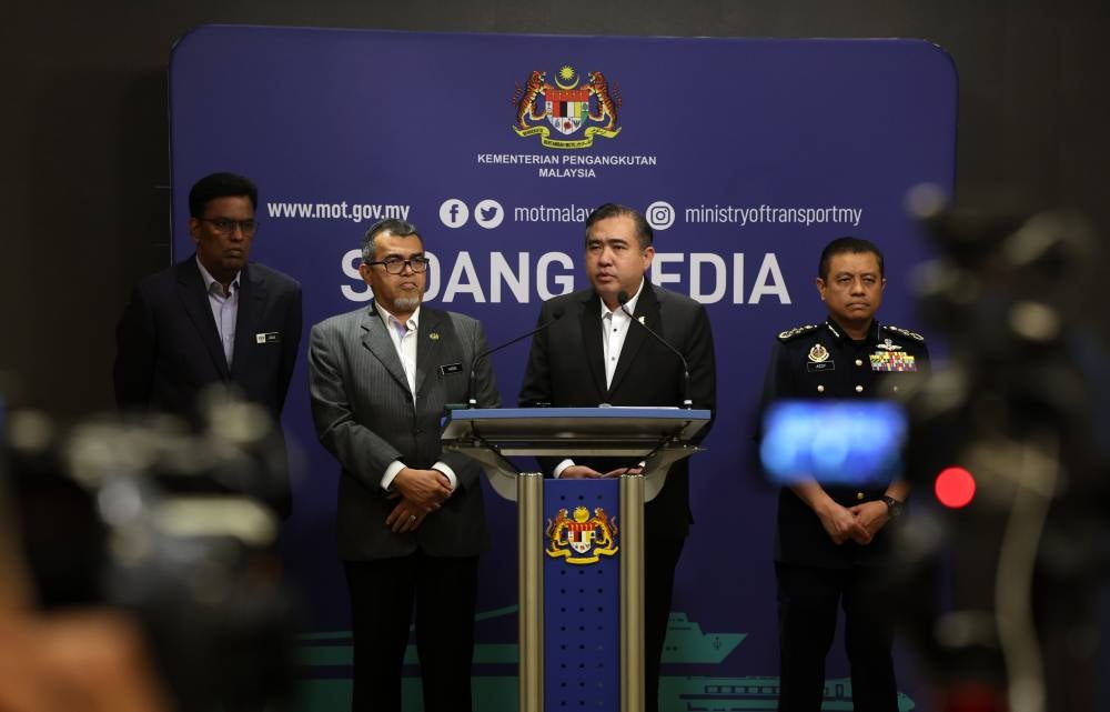 Transport Minister Anthony Loke (two, right) during a press conference after the Cabinet Committee Meeting on Road Safety and Traffic Congestion, today. - Photo by Bernama