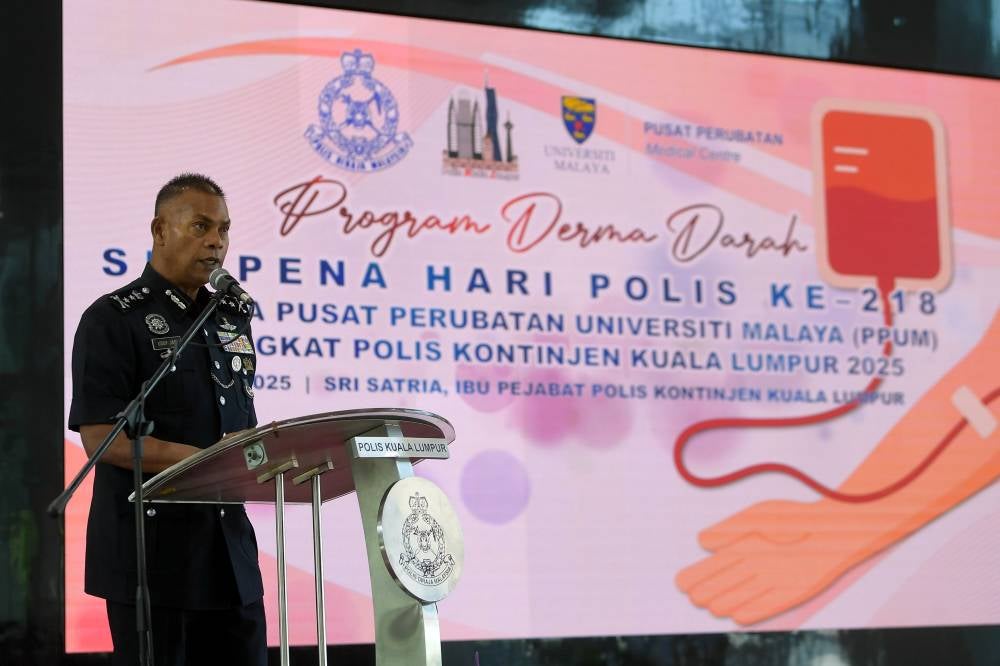 Kuala Lumpur deputy police chief Datuk Mohamed Usuf Jan Mohamad delivering a speech at the 218th Police Day at the Kuala Lumpur Police Headquarters, today. - Photo by Bernama