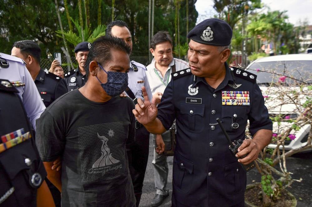 Driver of a stone-laden lorry Rudi Zulkarnain Mat Radi, 45, pleaded not guilty to nine counts of causing the death of nine FRU members in an accident on Jalan Chikus-Sungai Lampam on Tuesday. - Photo by Bernama