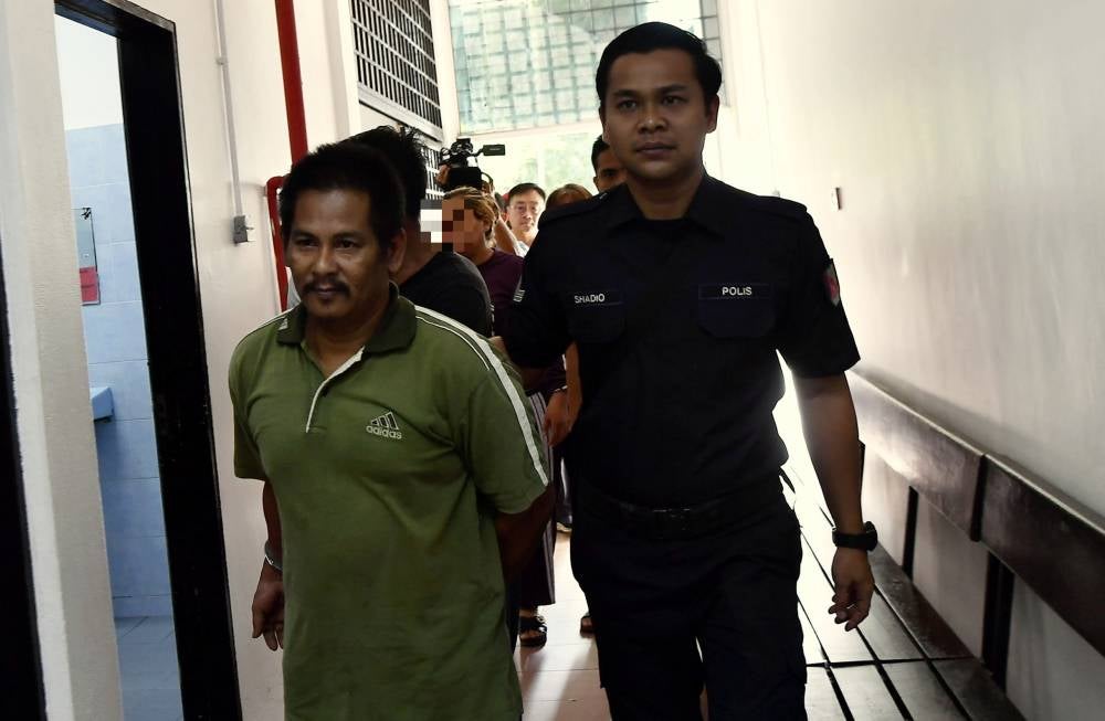 Rudi Zulkarnain Mat Radi, 45, pleaded not guilty to a charge of assisting in concealing the two cows, namely, a black KK Cross bull and a white Brahman bull belonging to Rozali Ismail, 66, from Kampung Sungai Keli, Hutan Melintang. - Photo by Bernama