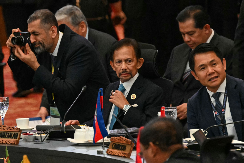 Sultan of Brunei Hassanal Bolkiah (C) attends the 2nd ASEAN-Gulf Cooperation Council (GCC) Summit after the 46th Association of Southeast Asian Nations (ASEAN) Summit in Kuala Lumpur on May 27, 2025. (Photo by Jam STA ROSA / AFP)