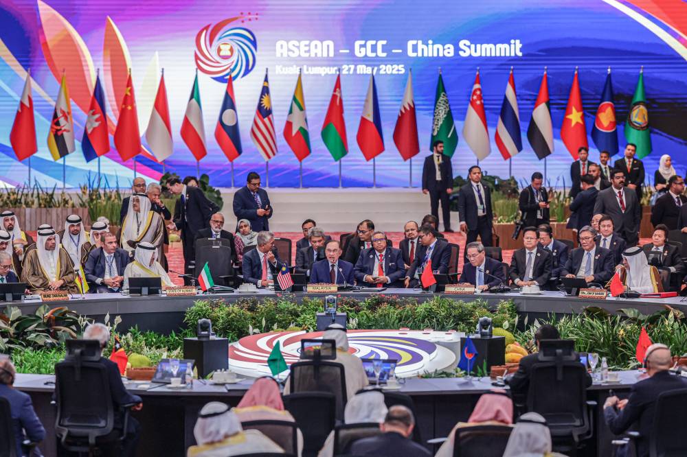 Prime Minister Anwar Ibrahim delivers his speech during the Asean-Gulf Cooperation Council (GCC)-China Summit at the Kuala Lumpur Convention Centre on Tuesday. Also present is Chinese Premier Li Qiang, alongside leaders and representatives from Asean, GCC member states and China. Photo by Bernama