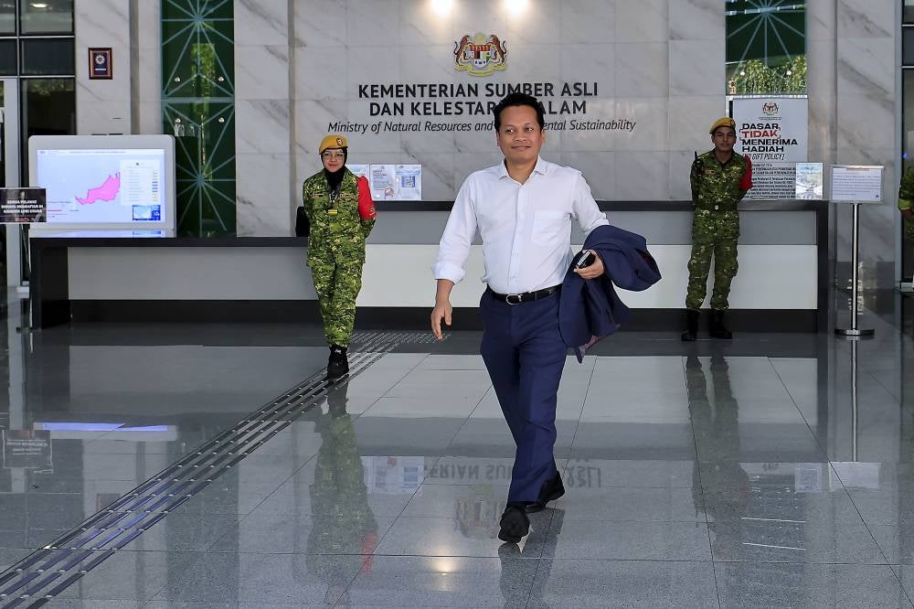 Natural Resources and Environmental Sustainability Minister Nik Nazmi Nik Ahmad leaves his office after announcing his resignation, which will take effect on July 4, 2025. - Photo by Bernama