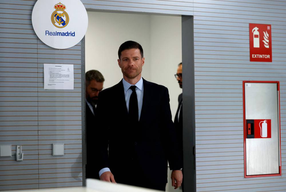 Newly appointed Real Madrid's coach Xabi Alonso arrives to give a press conference during his official presentation at Real Madrid Sports City in Valdebebas, near Madrid, on May 26, 2025. (Photo by Thomas COEX / AFP)