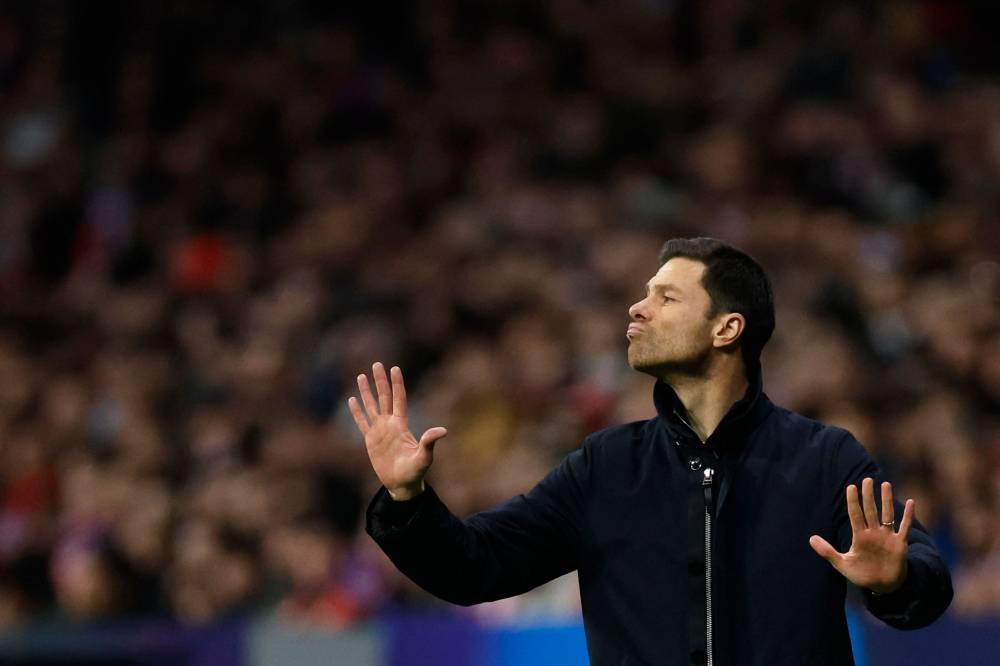 Xabi Alonso gestures during the UEFA Champions League, league phase football match between Club Atletico de Madrid and Bayer Leverkusen at the Metropolitano stadium in Madrid on January 21, 2025. (Photo by OSCAR DEL POZO/AFP)
