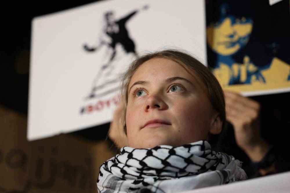 Swedish climate activist Greta Thunberg stages a pro-democracy rally to denounce "authoritarianism" in Georgia and neighbouring Azerbaijan, where the United Nations Climate Change Conference is taking place, in the Georgian capital of Tbilisi on Nov 11, 2024. - (Photo by GIORGI ARJEVANIDZE / AFP)