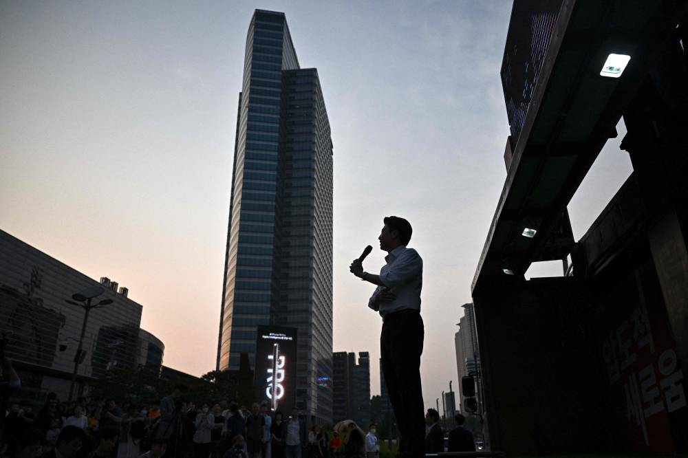 Lee Jun-seok, the presidential candidate for South Korea’s new Reform Party (RP), speaks during an election campaign event in Seoul on May 28, 2025. (Photo by Pedro Pardo / AFP)