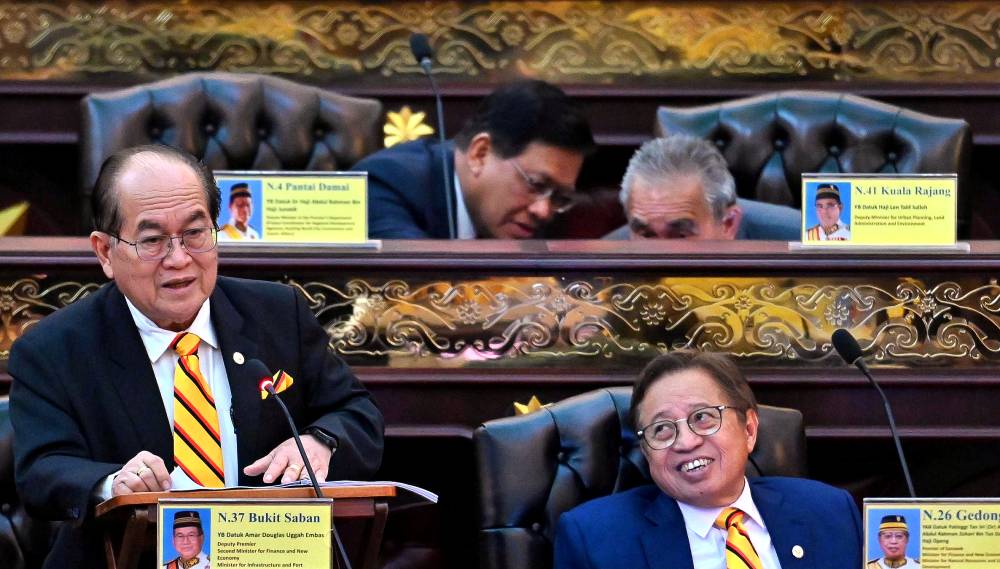 Sarawak Deputy Premier Datuk Amar Douglas Uggah Embas (left) - Photo by Bernama