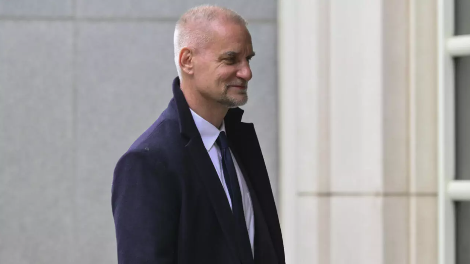Former Goldman Sachs chief of Southeast Asia operations, Timothy Leissner, arrives at US District Court Eastern District of New York for his sentencing, in New York on May 29, 2025. - (Photo by ANGELA WEISS / AFP)