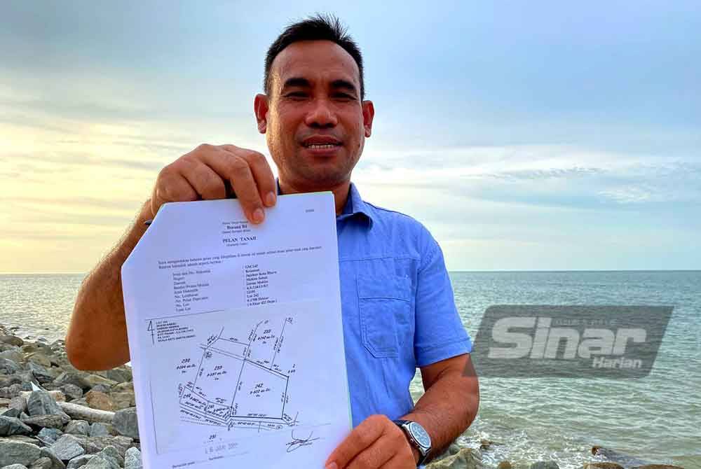 Azammanan showing the land grant to what was once his home