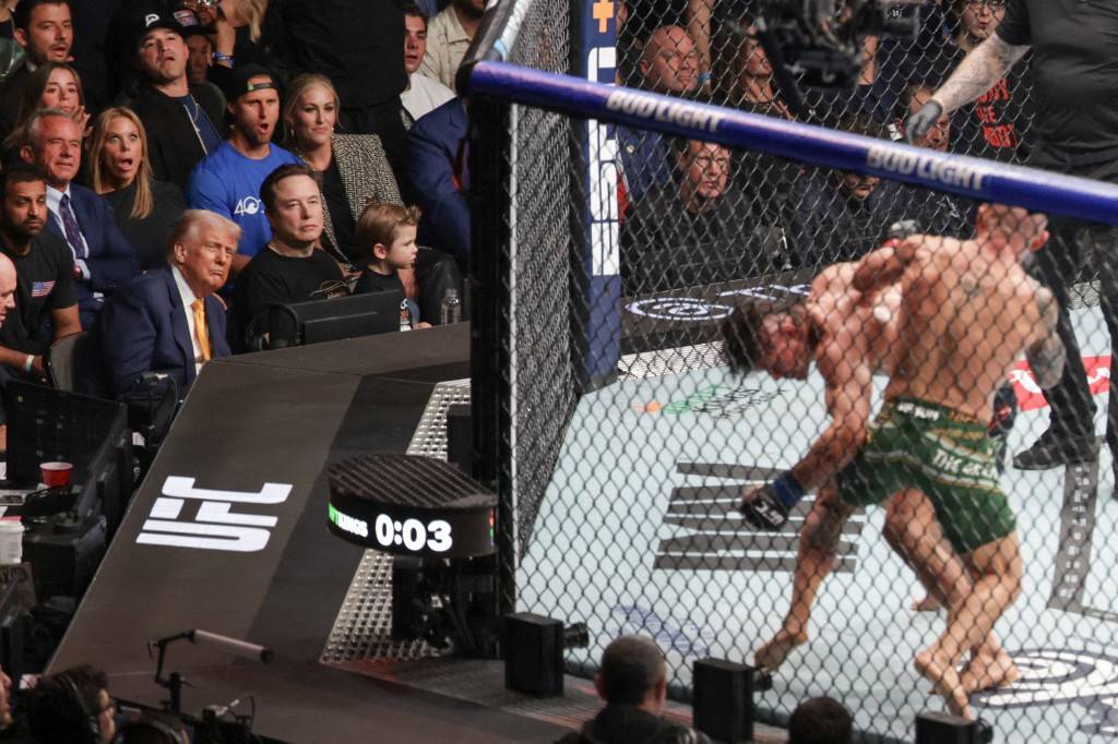 US President Donald Trump, along with (L-R behind him) FBI Director Kash Patel and Robert F. Kennedy Jr, Secretary of the US Department of Health and Human Services, Elon Musk and his son (seated to Trump's right), watch Australian fighter Alexander Volkanovski and Brazilian fighter Diego Lopes during an Ultimate Fighting Championship fight at the Kaseya Center on April 12, 2025 in Miami, Florida. AFP FILE PIX