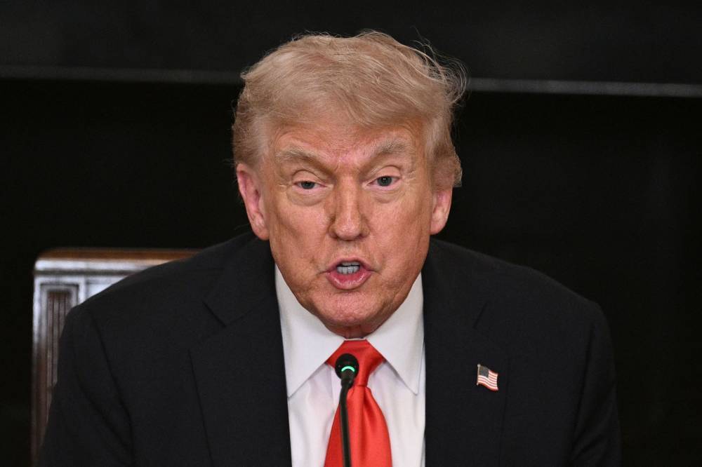 US President Donald Trump speaks during a roundtable discussion with the Fraternal Order of Police in the State Dining Room of the White House in Washington, DC, on June 5, 2025. - (Photo by BRENDAN SMIALOWSKI / AFP)