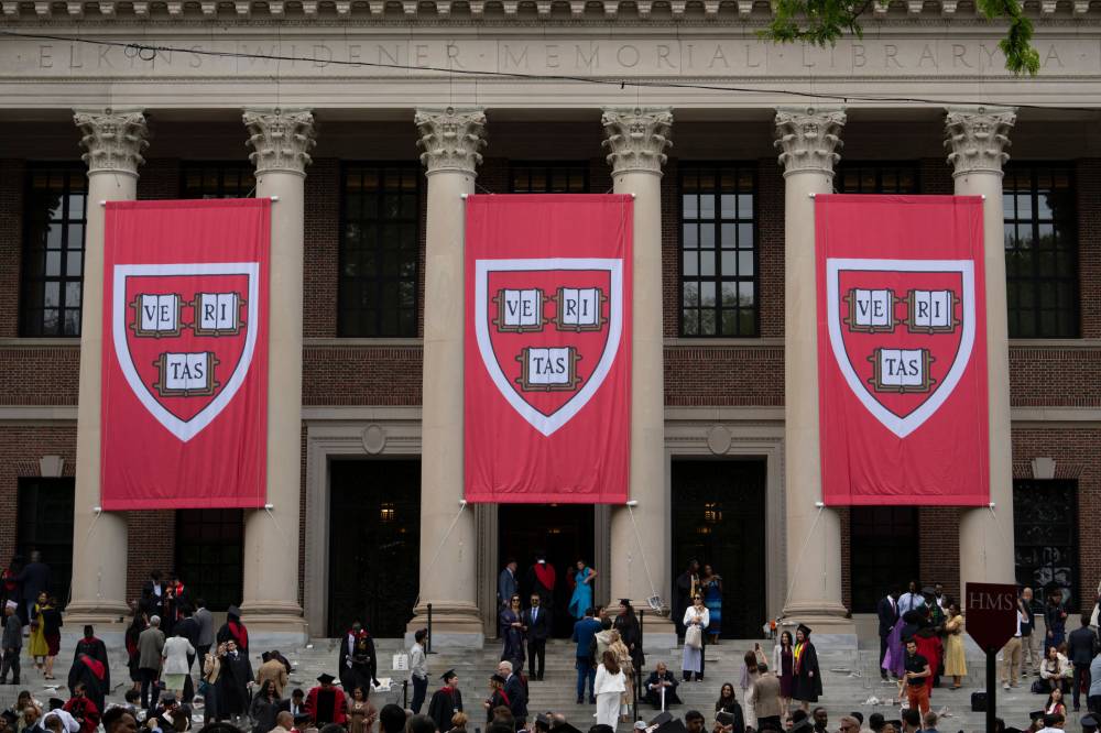 Harvard banners in front Widener Library during the 374th Harvard Commencement in Harvard Yard in Cambridge, Massachusetts, on May 29, 2025. - (Photo by Rick Friedman / AFP)