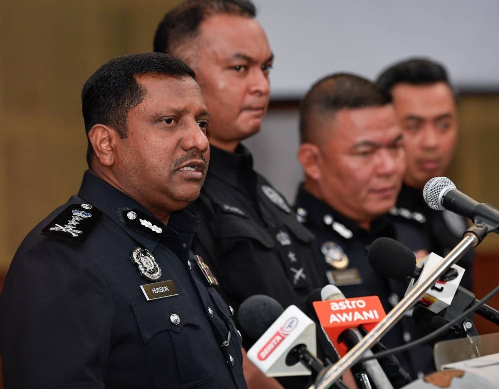 Selangor police chief Datuk Hussein Omar Khan (left) during a press conference today. Photo by Bernama