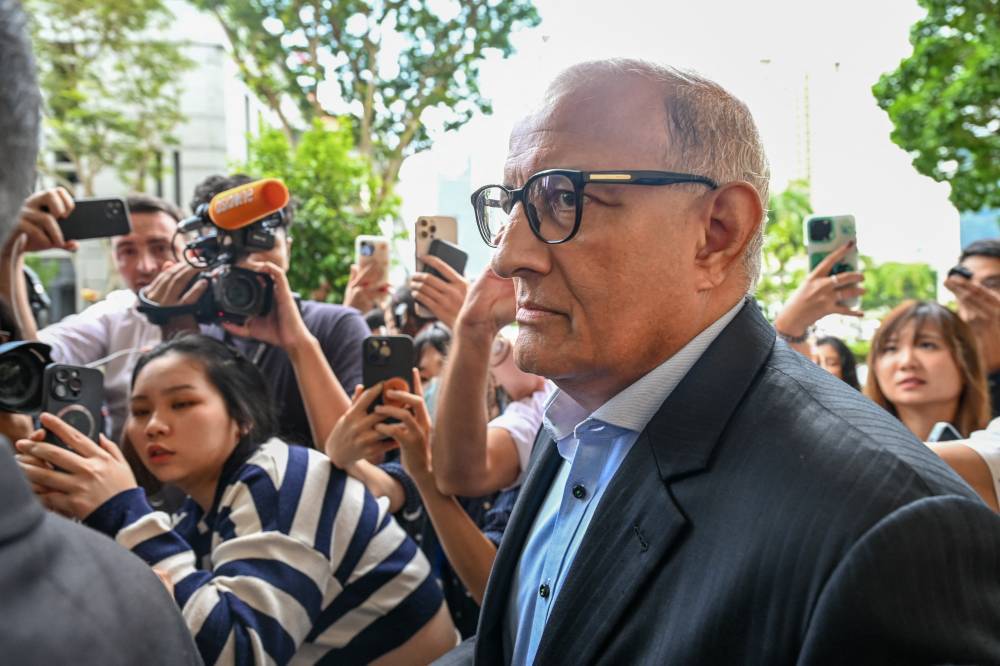 A Singapore court on Oct 3, 2024 sentenced former transport minister S. Iswaran to 12 months in prison, local media reported, in the financial hub's first case involving a political office holder in more than four decades. - (Photo by ROSLAN RAHMAN / AFP)