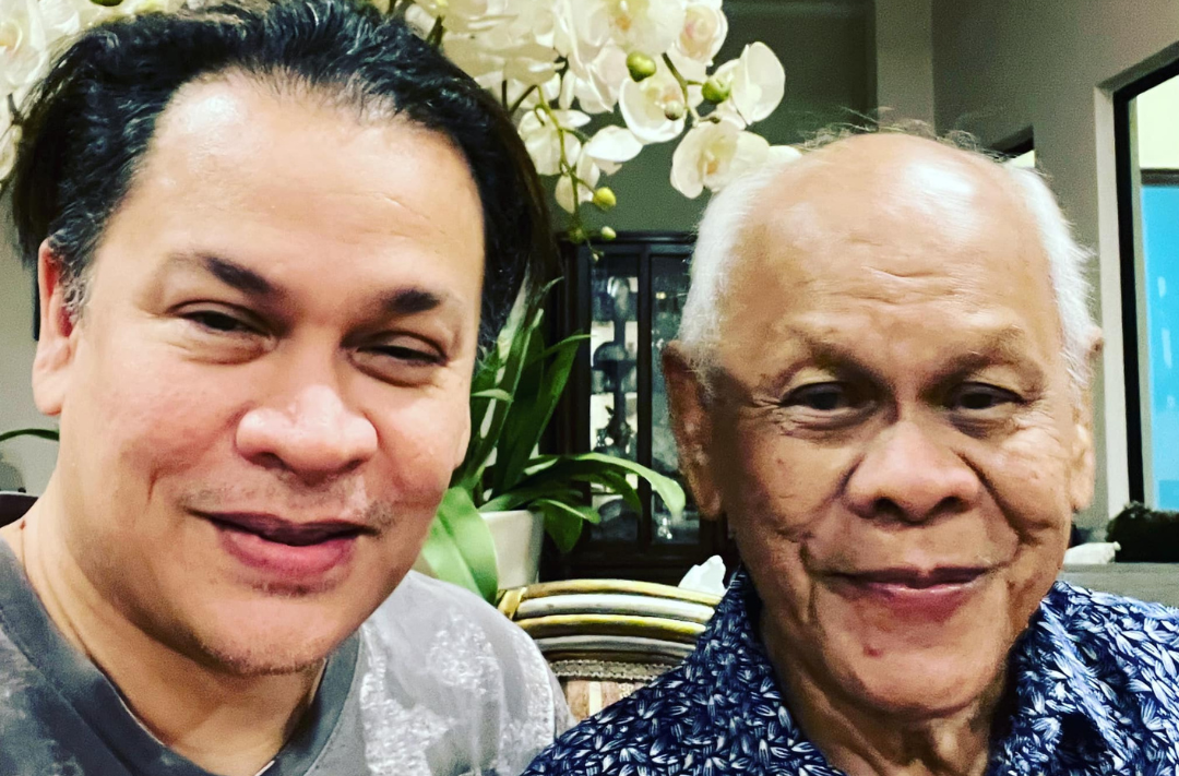 Norman with his father, Abdul Halim Kamal. Photo: Norman's Facebook account