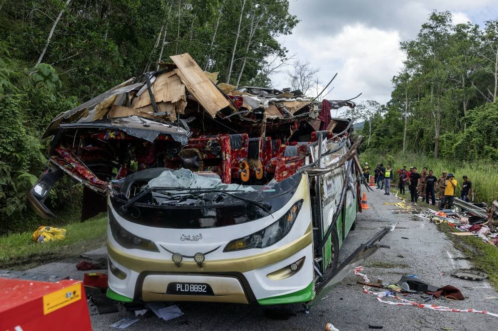 The post-mortem process for 13 of the 15 Universiti Pendidikan Sultan Idris (UPSI) students killed in a crash at KM53 of the East-West Highway near Gerik early this morning is expected to be completed by midnight tonight. Photo by Bernama