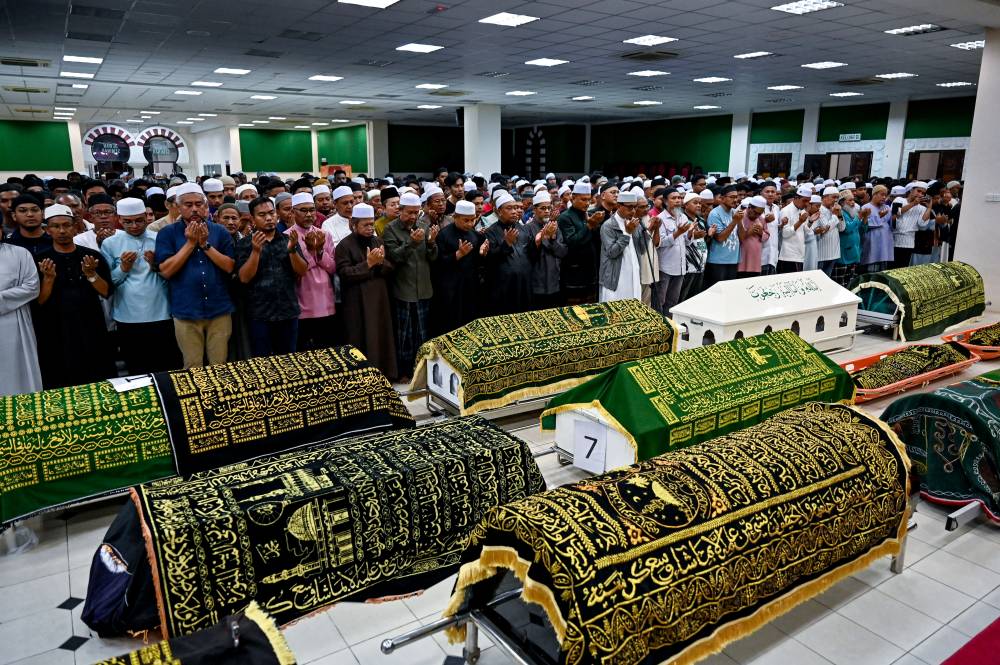 In the tragic incident on Monday, 15 UPSI students lost their lives when the bus they were traveling in overturned at KM53 of the East-West Highway (JRTB), near Tasik Banding, Gerik. Photo by Bernama