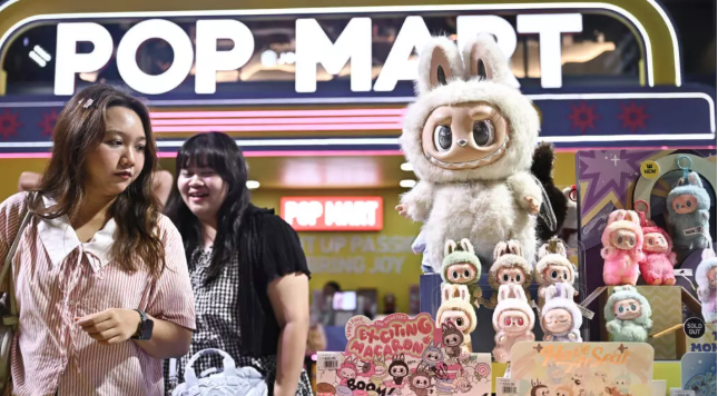 Labubus have been endorsed by celebrities such as Rihanna and Dua Lipa, and fans have queued overnight outside stores hoping to snag one. Photo by Lillian SUWANRUMPHA/AFP