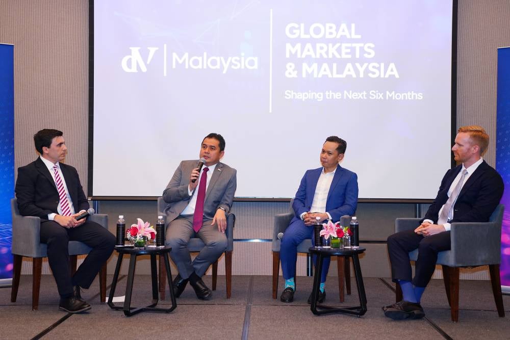 Mohamad Nizar (second from left) with the panel and host of 'Global Markets & Malaysia: Shaping the Next Six Months' at Equatorial (EQ) Plaza, Kuala Lumpur on Wednesday.
