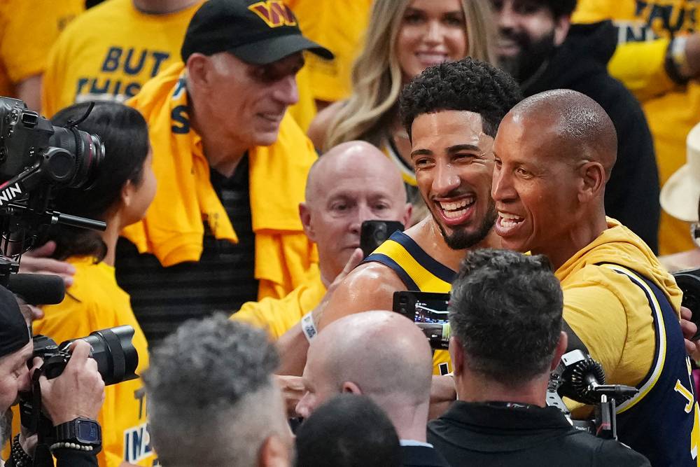Tyrese Haliburton #0 of the Indiana Pacers celebrates with former NBA player Reggie Miller following the victory against the Oklahoma City Thunder in Game Three of the 2025 NBA Finals at Gainbridge Fieldhouse on June 11, 2025 in Indianapolis, Indiana. Photo by Dylan Buell/Getty Images via AFP