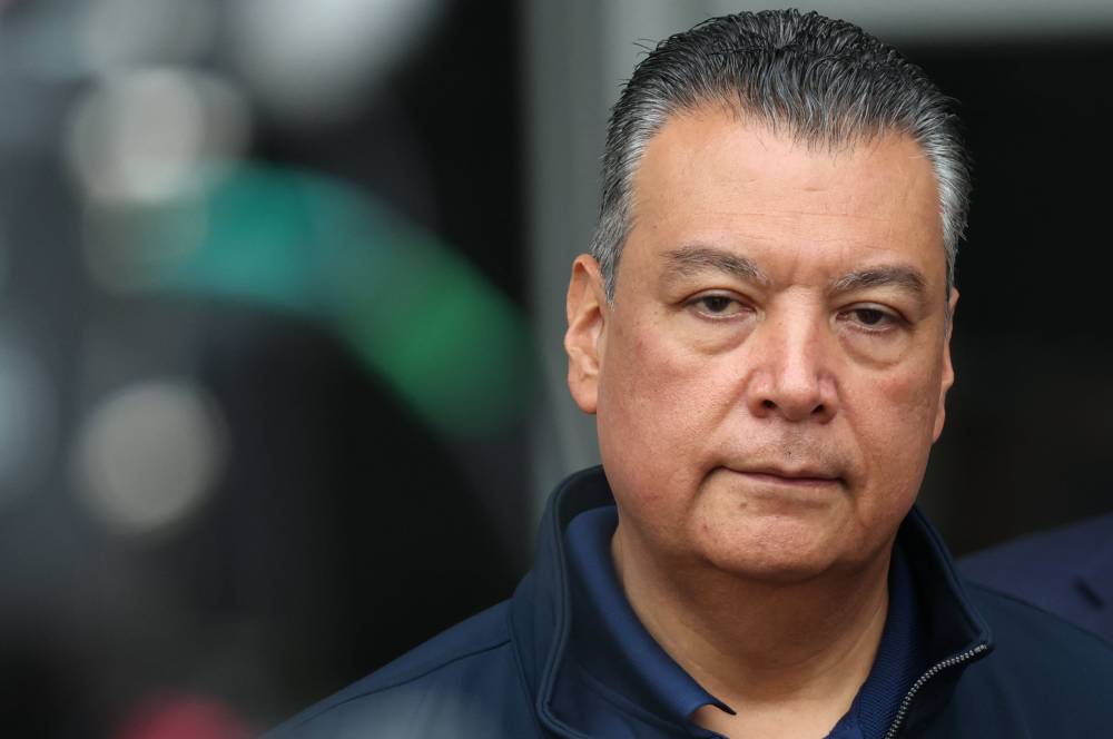 US Senator Alex Padilla, Democrat from California, speaks to reporters outside of the Wilshire Federal Building, after he was forcibly removed after interrupting a news conference being held by Secretary of Homeland Security Kristi Noem. Photo by Patrick T. Fallon/AFP