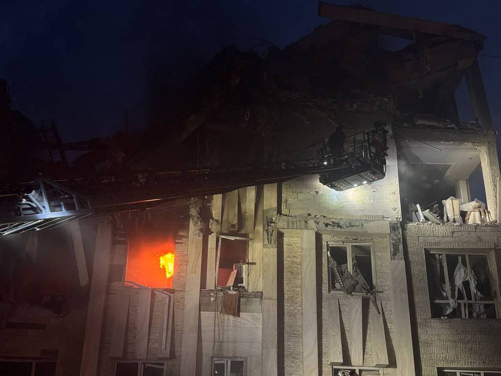 This handout photo released by Iran's Revolutionary Guard Corps (IRGC) official Sepah News Telegram channel on June 13, 2025 reportedly shows a damaged building in Tehran on fire following Israeli strikes on the Iranian capital early in the morning. - (Photo by SEPAH NEWS / AFP)