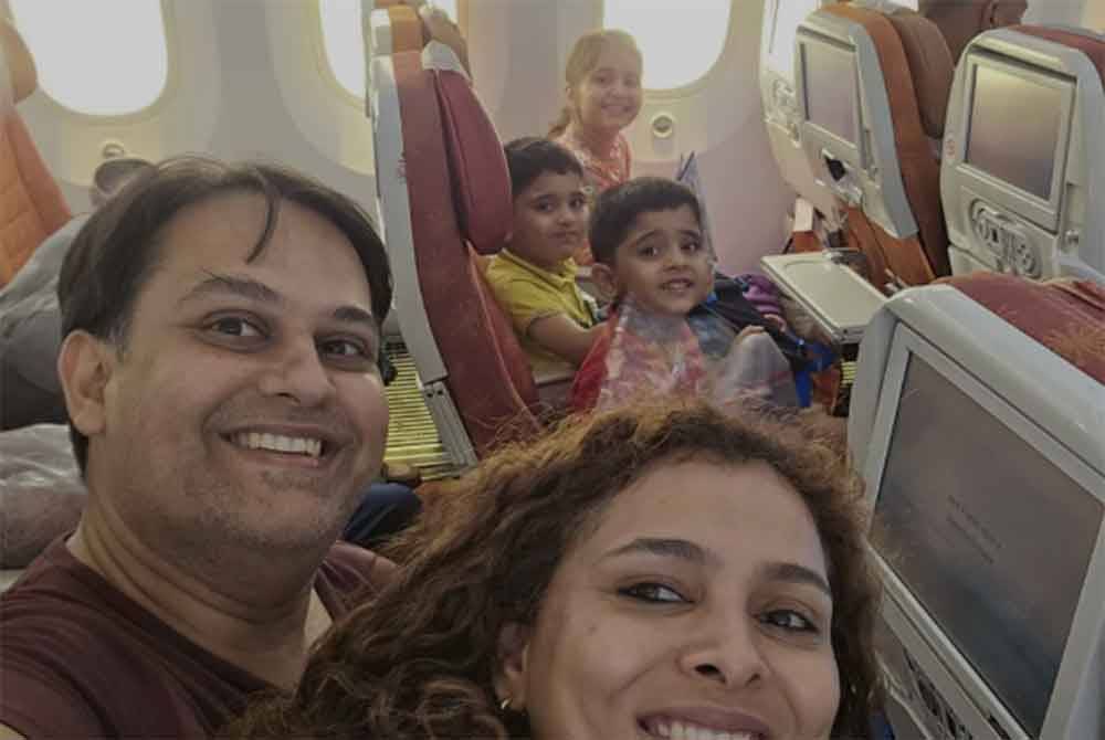 Their final family selfie on board the plane. Photo: Social Media