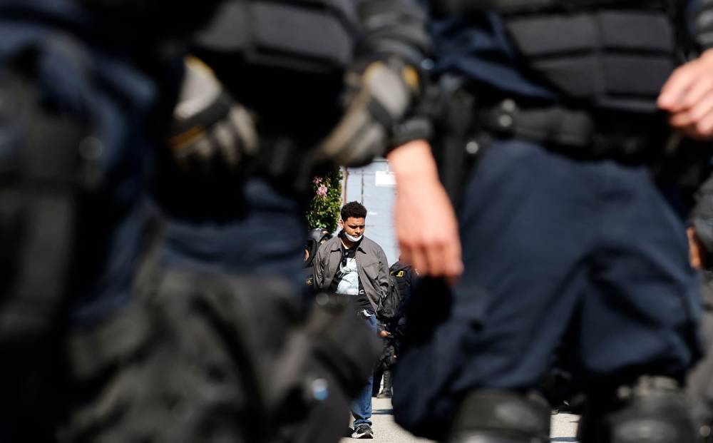 California Highway Patrol (CHP) officers detain protesters near the 101 freeway on June 10, 2025 in Los Angeles, California. Tensions in the city remain high after the Trump administration called in the National Guard against the wishes of Gov. Gavin Newsom and city leaders following two days of clashes with police during a series of immigration raids. - (Photo by MARIO TAMA / AFP)