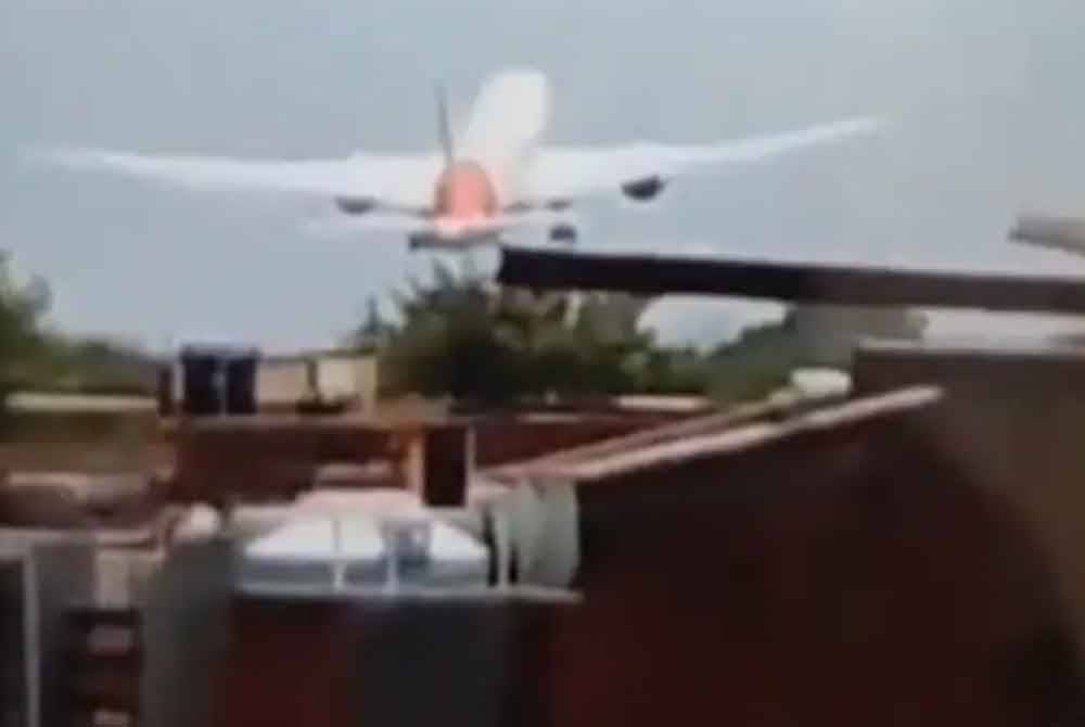 A screenshot from a video of the moment before Air India AI171 aircraft crashed in Ahmedabad.