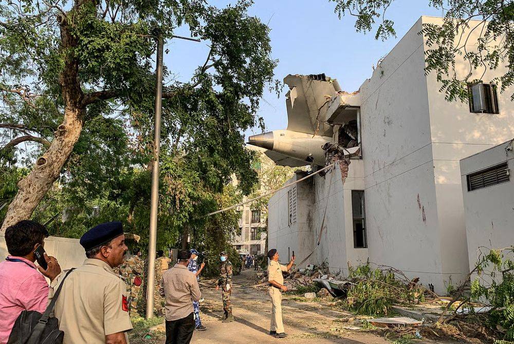 Visuals from BJMC Ahmedabad where the Air India flight crashed on Thursday, June 12. - Photo by AFP