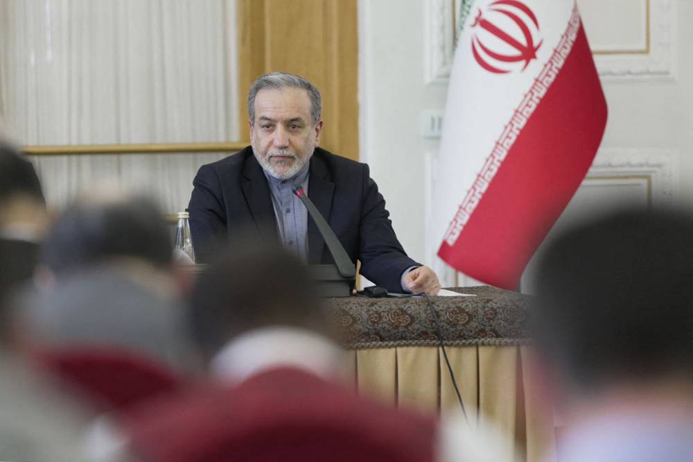 This handout picture provided by the Iranian foreign ministry shows Iran's Foreign Minister Abbas Araqchi meeting with ambassadors of foreign countries in Tehran on June 15, 2025. Israel and Iran traded heavy fire for a third straight day on June 15, with mounting casualties and expanding targets marking a sharp escalation in hostilities between the longtime foes. - (Photo by Iran's Ministry of Foreign Affairs / AFP)