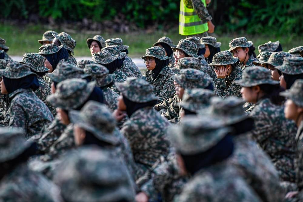 Trainees under the PLKN 3.0 Series 2/2025 undergo a light weapons shooting session at the First Battalion Royal Malay Regiment Firing Range, Sungai Besi Camp, on June 14, 2025. - Photo by Bernama