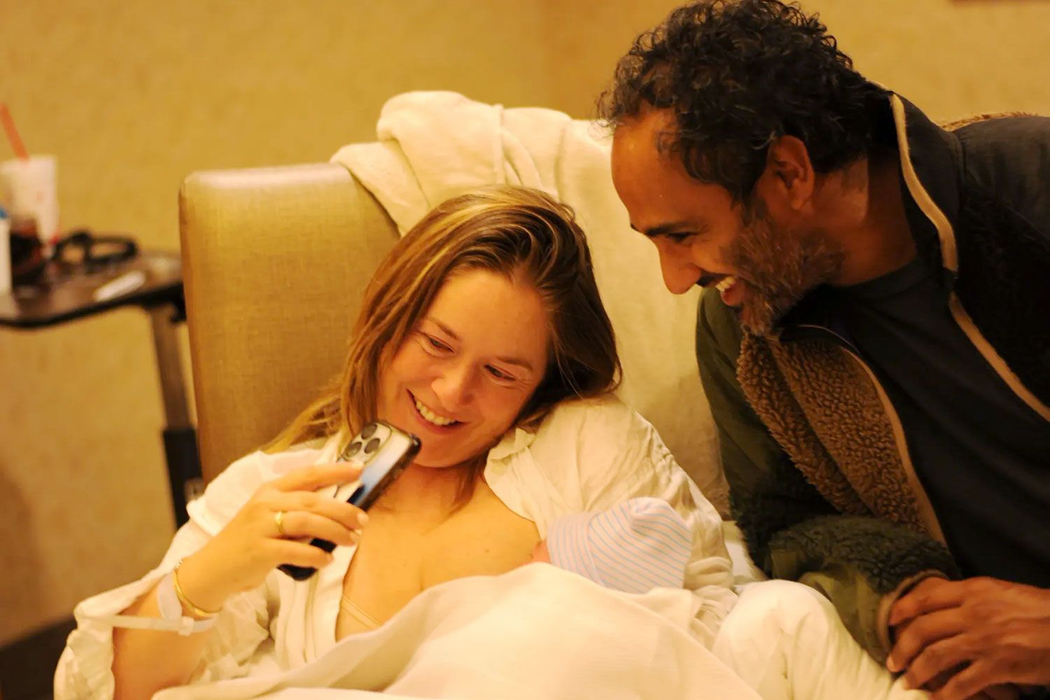 Rohan Silva and Kate upon the delivery of their second child after 20 failed IVF attempts and the death of their late daughter in 2022. They later received another child in November 2024, four months apart from the child born by Kate, with the new one born via a surrogate mother of three named Ava in Mississippi, United States. Photo credit: Instagram @people